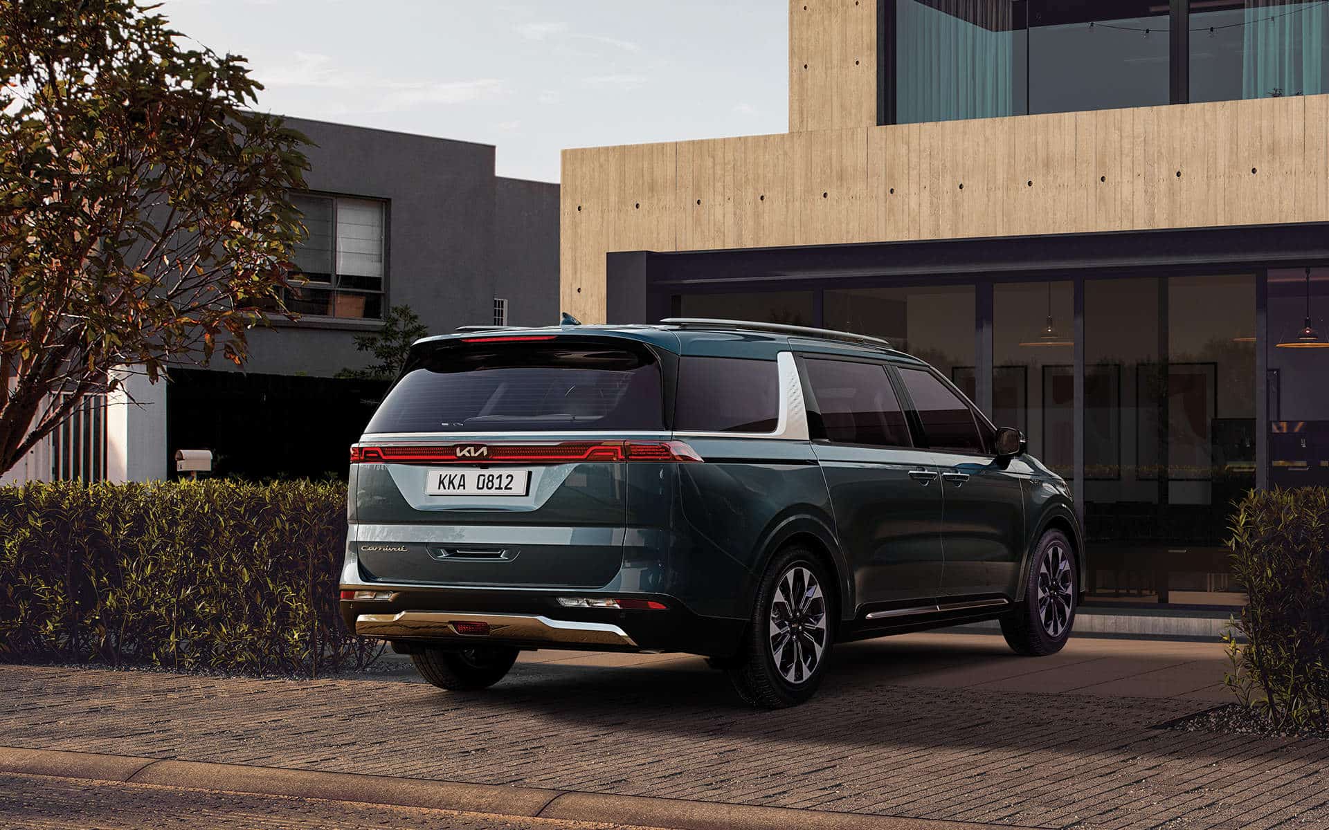 [Imagen: Familia puertorriqueña disfrutando de su Kia Carnival 2024]